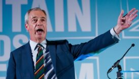 Nigel Farage, Reform UK leader, speaks on stage